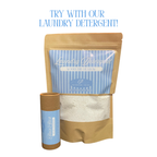 Laundry detergent package with blue and white striped label on a white background