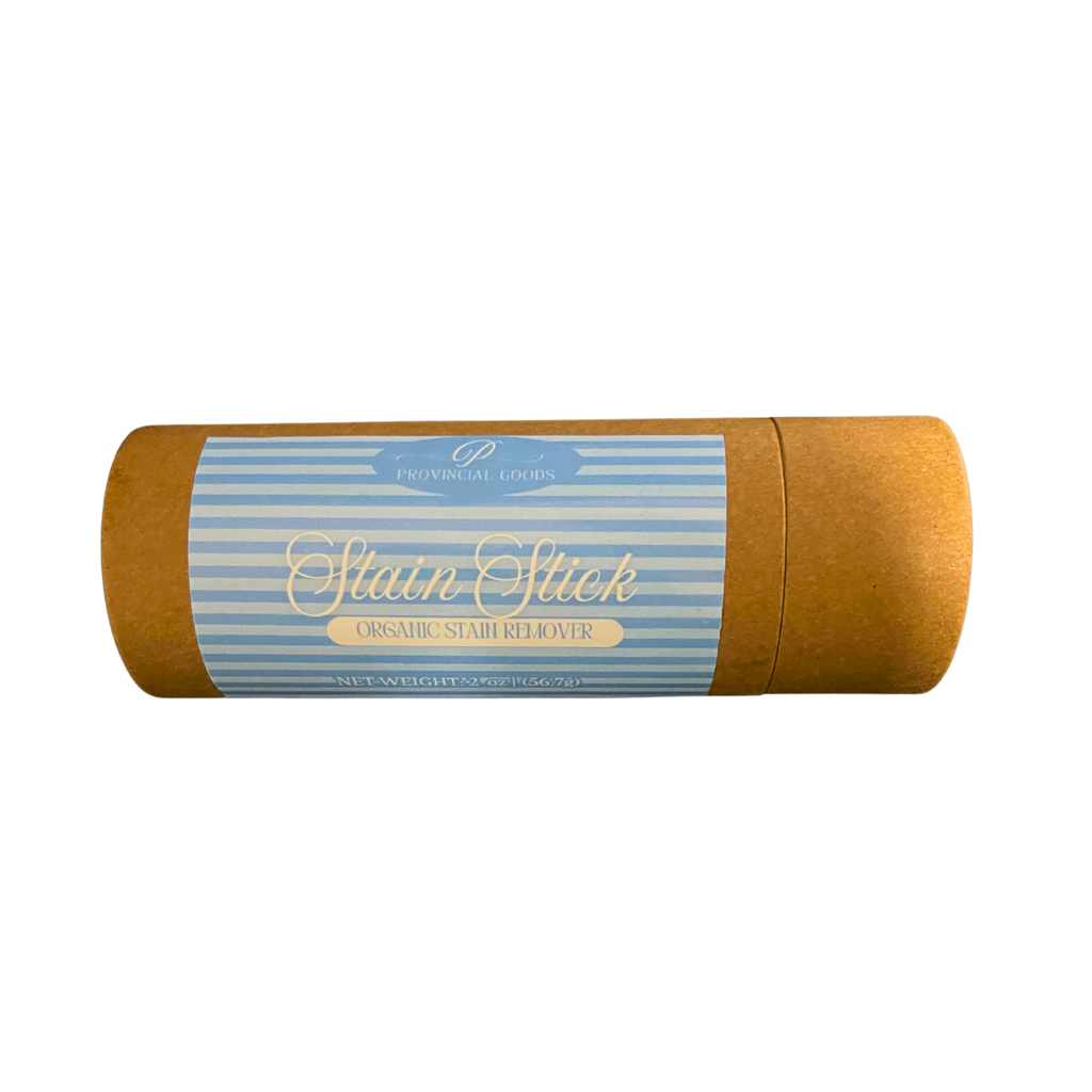 Stain Stick with blue and brown packaging on a white background